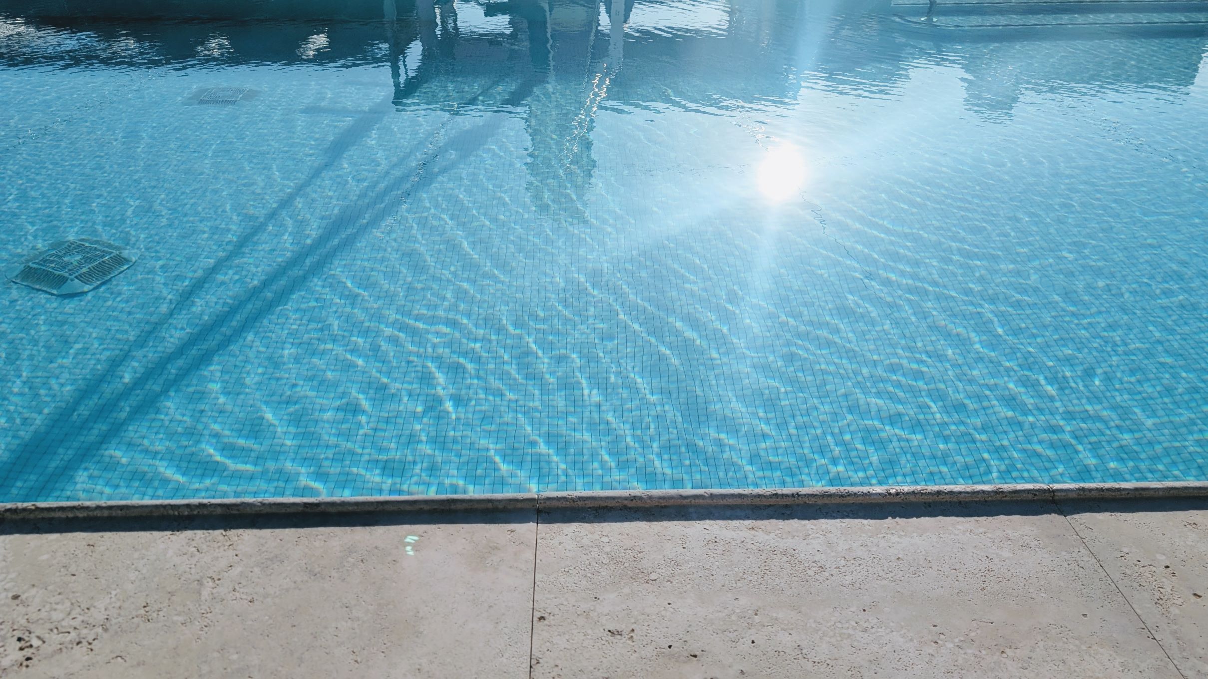 Hotel pool and deck at a vacation destination