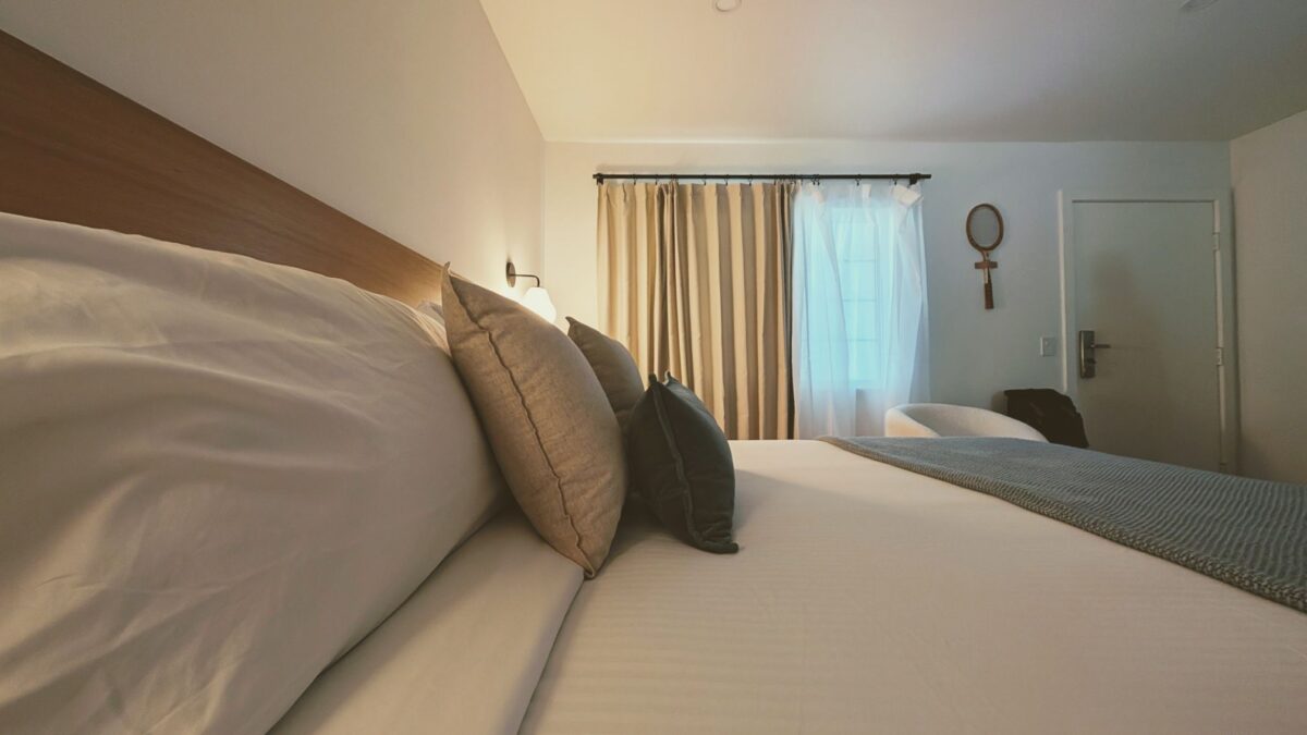 Pillows on king bed in Casa Palma Bungalow hotel room
