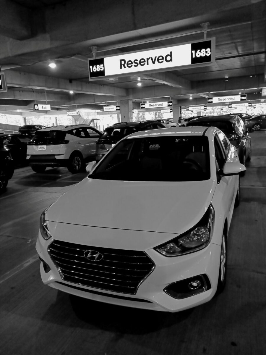 White Hyundai car at Atlanta Airport Thrifty Car Rental garage